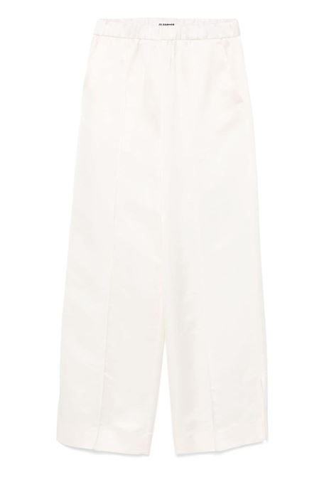 Pantaloni in raso in bianco Jil sander - donna